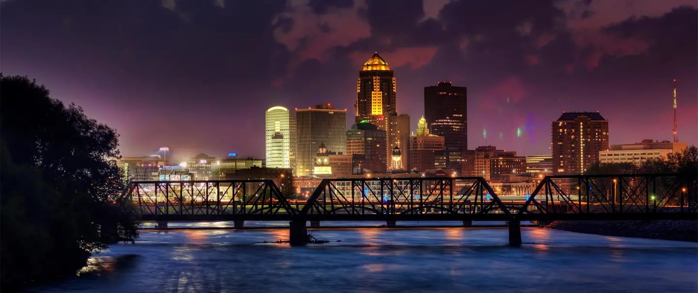 Des Moines skyline at nighttime, from across the water